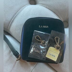 La Mer Navy Case with Gold Accents and 2 keychains